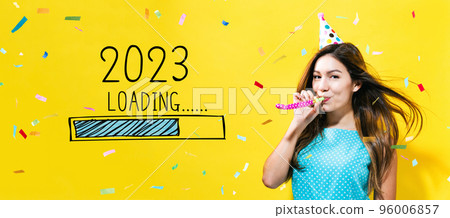 Loading new year 2023 with young woman with party theme 96006857