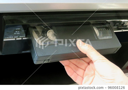 Insert the videotape into the deck 96008126