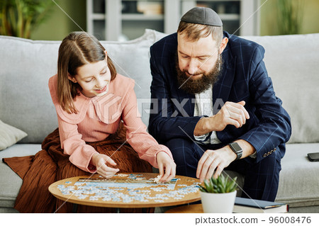 Jewish Father with Daughter Doing Puzzles Jewish Father with Daughter Doing Puzzles 96008476