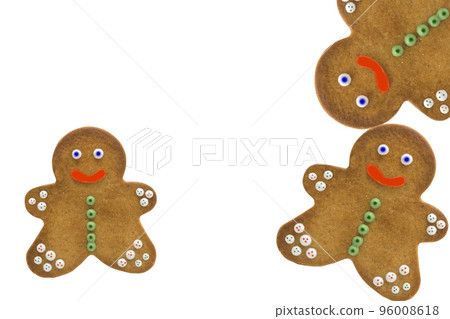 gingerbread man cookies decorated with icing sugar on white background. Christmas food, pastry background. New Year theme. Merry Christmas and Happy New Year Holidays greeting card, frame, banner gingerbread man cookies decorated with icing sugar on white background. Christmas food, pastry background. New Year theme. Merry Christmas and Happy New Year Holidays greeting card, frame, banner 96008618