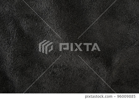 Black suede close-up. Natural black suede texture for design or project. Velvet, leather reverse. 96009885