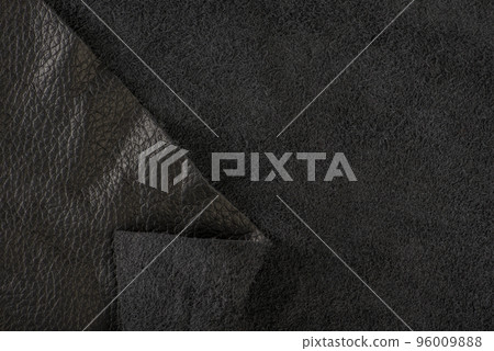 Black suede close-up. Natural black suede texture for design or project. Velvet, leather reverse. 96009888