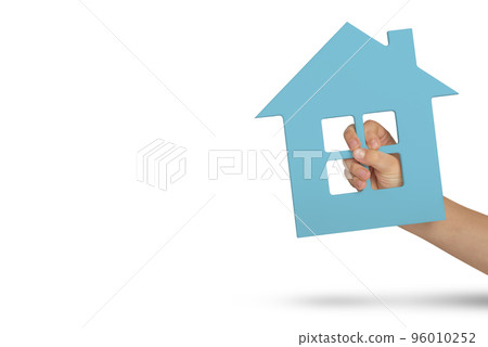 House in hand, isolation. Green model of a house in the hands of a child isolated on a white background. Homeless housing, family home, home insurance, international family day House in hand, isolation. Green model of a house in the hands of a child isolated on a white background. Homeless housing, family home, home insurance, international family day 96010252
