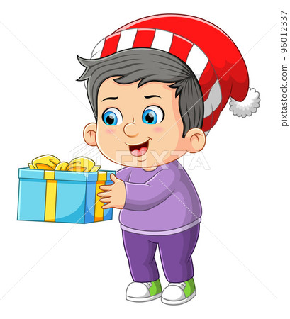 The happy boy is holding the surprise gift from the parents The happy boy is holding the surprise gift from the parents 96012337