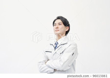 Portrait of a worker looking into the distance White background 96013861