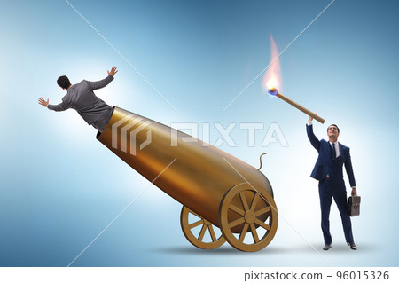 Concept of lay-off with businessman and cannon 96015326
