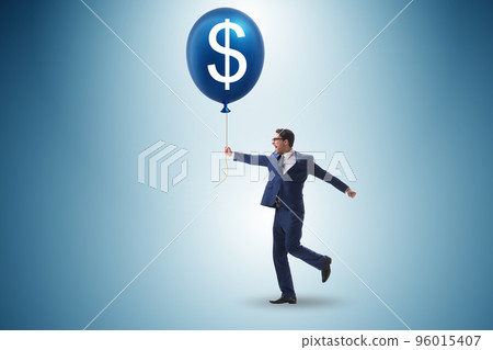 Businessman with dollar balloon concept Businessman with dollar balloon concept 96015407