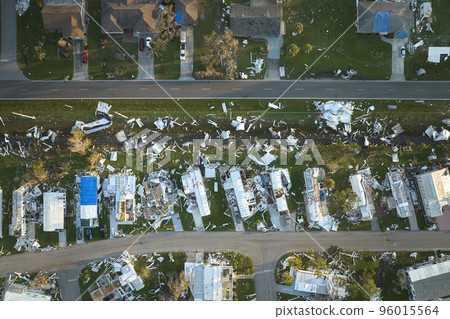 Hurricane Ian destroyed homes in Florida residential area. Natural disaster and its consequences Hurricane Ian destroyed homes in Florida residential area. Natural disaster and its consequences 96015564