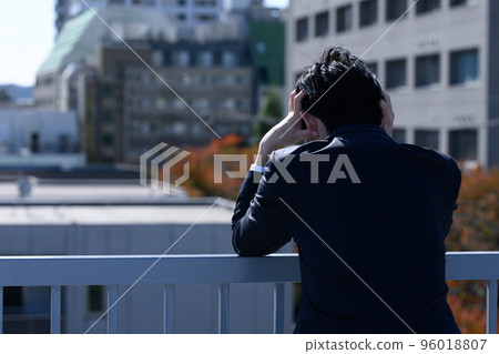 person depressed during work break 96018807