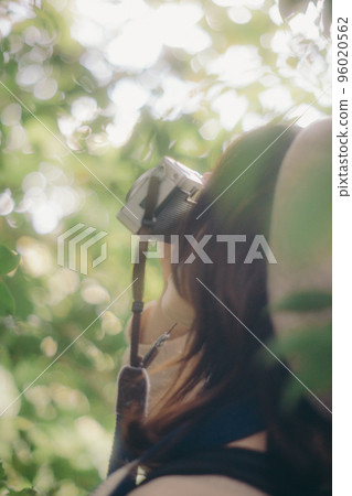 Photo of a woman standing in nature Photo of a woman standing in nature 96020562