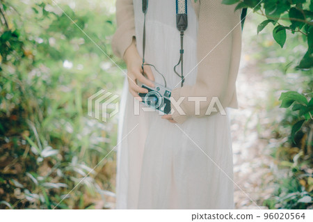 Photo of a woman standing in nature Photo of a woman standing in nature 96020564