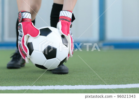 Goalkeeper man setting a soccer ball Goalkeeper man setting a soccer ball 96021343