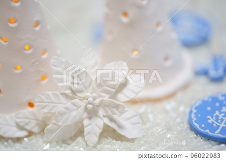 Handmade Christmas decorations white lanterns and poinsettias made of lightweight paper clay Handmade Christmas decorations white lanterns and poinsettias made of lightweight paper clay 96022983