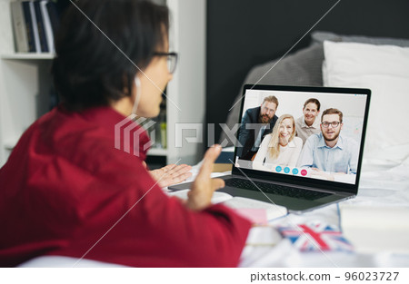 woman laptop group call 96023727