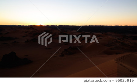Sunset view to Tin Merzouga dune at Tassili nAjjer national park in Algeria 96023919
