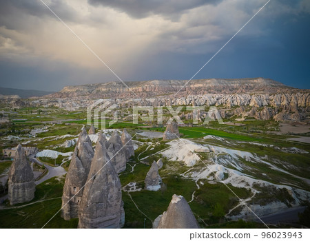 Sunset panoramic view to Goreme city, Cappadocia, Turkey Sunset panoramic view to Goreme city, Cappadocia, Turkey 96023943