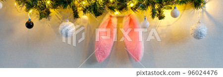 banner of Rabbit ears in the christmas tree on white background. banner of Rabbit ears in the christmas tree on white background. 96024476