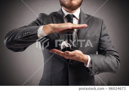 Caged businessman Caged businessman 96024671