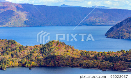 A white pleasure boat on Lake Towada from Kodakedai A white pleasure boat on Lake Towada from Kodakedai 96028087