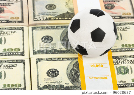 Money and soccer ball 96028687
