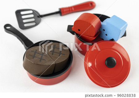 Toy cooking utensils and wooden food. play house image Toy cooking utensils and wooden food. play house image 96028838