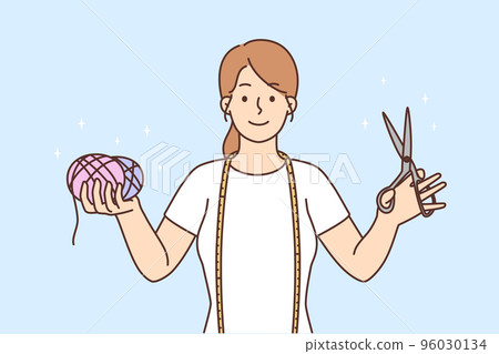 Seamstress with scissors and threads in hands  96030134