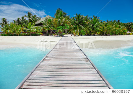 Way to paradise tropical resort island in ocean waves Way to paradise tropical resort island in ocean waves 96030197