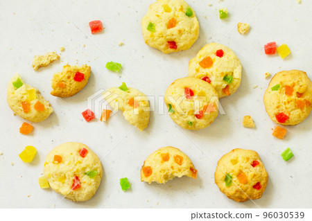 Cookies bar. Homemade cookies with candied fruit, isolate on a light stone table. Top view flat lay background. Cookies bar. Homemade cookies with candied fruit, isolate on a light stone table. Top view flat lay background. 96030539