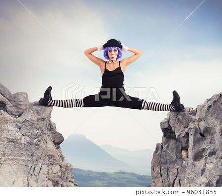 Clown between two mountains Clown between two mountains 96031835