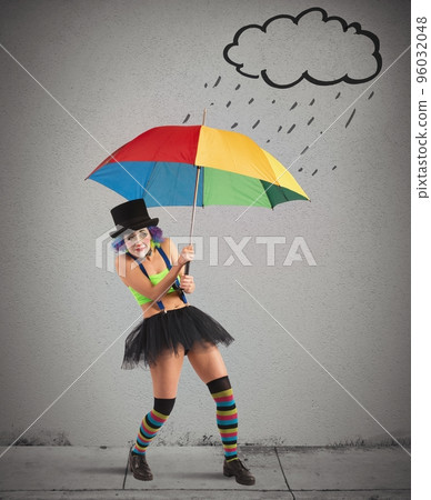 Clowns with rainbow umbrella 96032048
