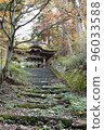 Gate at the end of moss-covered stone steps in the mountains 96033588