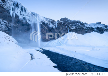 Seljalandsfoss waterfall, Iceland. Icelandic winter landscape. High waterfall and rocks. 96034113