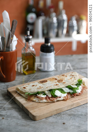 Italian cuisine , Piadina with Italian ham and cheese 96034321