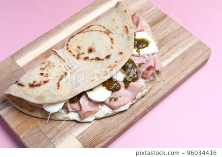 Italian cuisine , Piadina with Italian ham and cheese 96034416