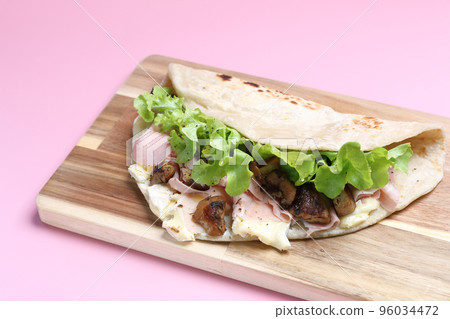Italian cuisine , Piadina with Italian ham and cheese 96034472