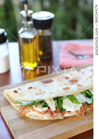 Italian cuisine , Piadina with Italian ham and cheese 96034474