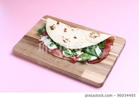 Italian cuisine , Piadina with Italian ham and cheese 96034495