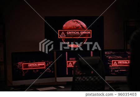 Workplace of IT engineer or software developer with computer monitors Workplace of IT engineer or software developer with computer monitors 96035403