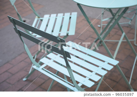 Empty table and chairs of cafe outdoor Empty table and chairs of cafe outdoor 96035897