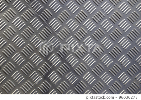 Anti-slip metal platform background texture. Metal sheet of industrial flooring. Anti-slip metal platform background texture. Metal sheet of industrial flooring. 96036275