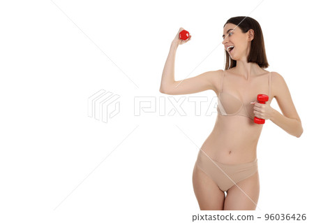 Concept of weight loss with slim young woman isolated on white background Concept of weight loss with slim young woman isolated on white background 96036426