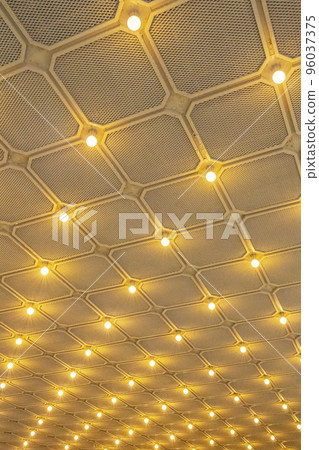 Neatly arranged lighting (lights) at hotel, movie and theater entrances 96037375