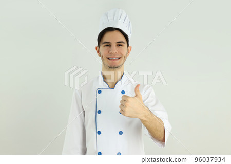 Concept of cooking, young male chef on light background 96037934