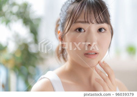 Beauty skin care young woman suffering from rough skin Beauty skin care young woman suffering from rough skin 96039379