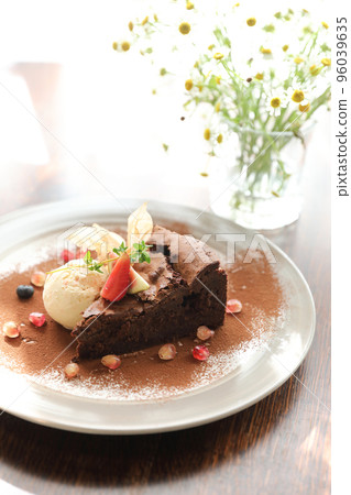 Chocolate cake with ice cream dessert on wood table Chocolate cake with ice cream dessert on wood table 96039635