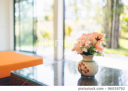 pink flower in jar on wood table with space for text pink flower in jar on wood table with space for text 96039792