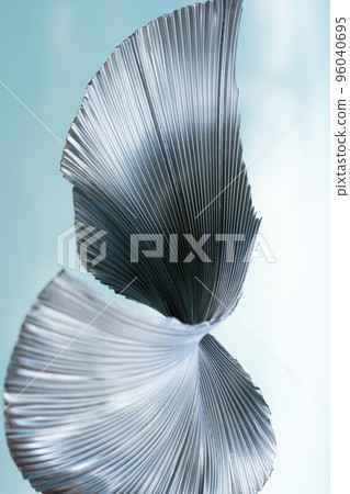 Art piece. Abstract background. Embossed iron. Blue silver white color gradient glow reflection on ridged curved metal texture creative illustration wallpaper. Art piece. Abstract background. Embossed iron. Blue silver white color gradient glow reflection on ridged curved metal texture creative illustration wallpaper. 96040695