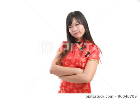 beauty woman wear red cheongsam looking and smile in chinese new year beauty woman wear red cheongsam looking and smile in chinese new year 96040709