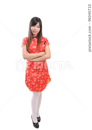 beauty woman wear red cheongsam looking and smile in chinese new year beauty woman wear red cheongsam looking and smile in chinese new year 96040710