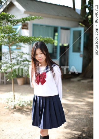 Japanese school girl in local coffee shop Japanese school girl in local coffee shop 96040712